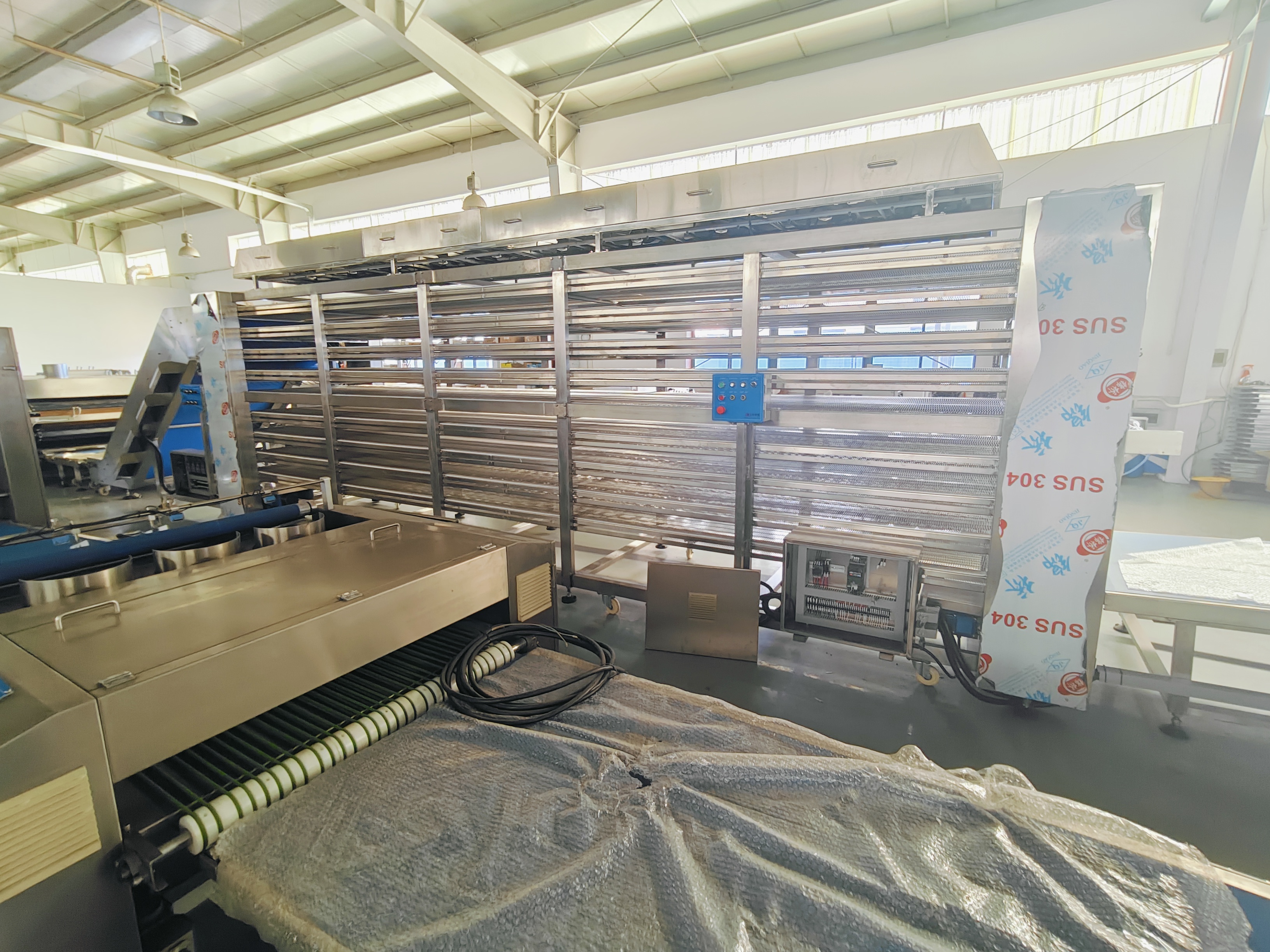 نظام الخبز والتبريد المتقدم للترتيلا: الكفاءة والاستدامة مع FQTT BAKERY MACHINERY